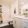 Modern bathroom interior at Eleanor in Seattle with vanity and bathtub