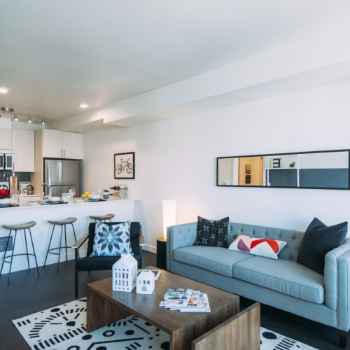 Eleanor Seattle apartment with living room and bar seating
